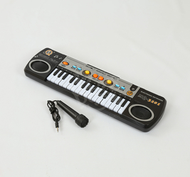 Элекстросинтезатор с микрофоном. 